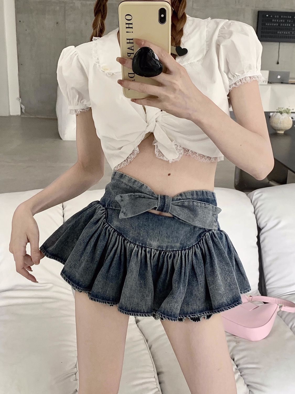 Cute Butterfly Denim Skirt For Women styled with a front bow and ruffled hem, designed for modern and playful fashion statements.