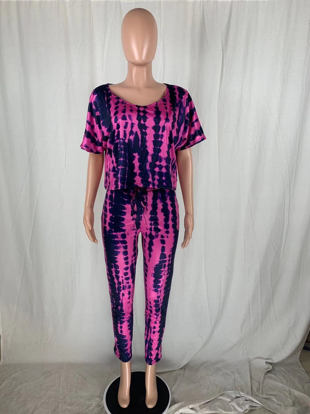 Krasa Womens Women's Skirt Women only for ladies use only, displayed on mannequin in pink and black tie-dye co-ord set with short-sleeve top and fitted pants. Ideal for stylish comfort.