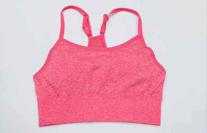 Pink yoga vest sports underwear women with adjustable straps and seamless design, perfect for ladies' fitness and yoga routines.