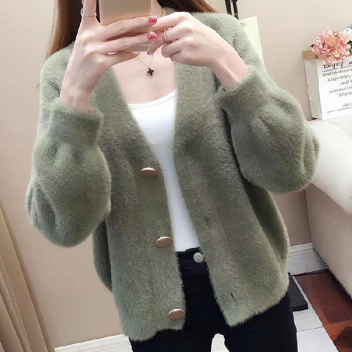 Fashionable knitted short loose outer top for women in sage green, breathable and stylish for layering over spring or autumn attire.