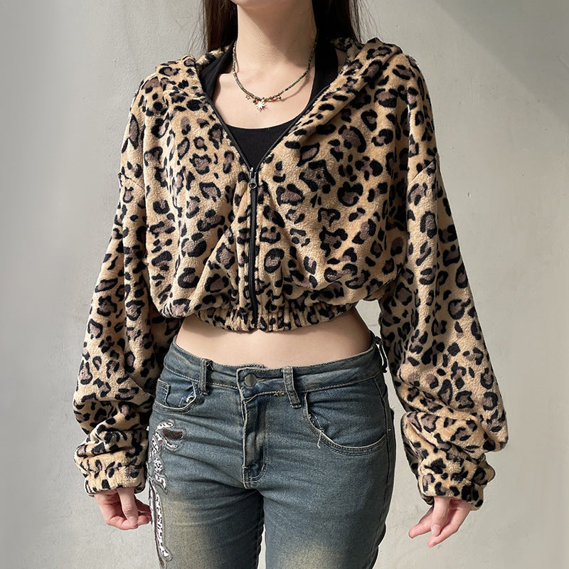 Leopard print hooded zip cardigan top for women, featuring long sleeves and a cozy cropped design ideal for layering in trendy outfits.