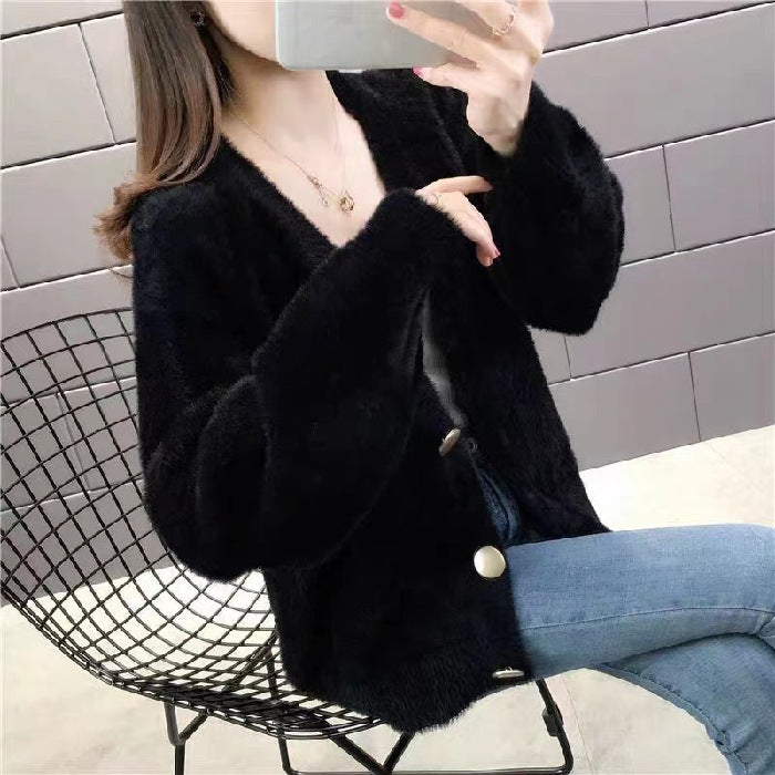 Fashionable knitted short loose outer top for women in black, designed with oversized sleeves and gold buttons, perfect for casual fall outfits.