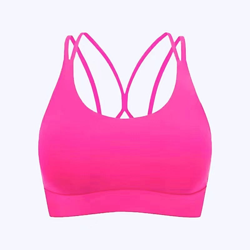 Hot pink fitness yoga sports underwear women only for ladies only, vibrant and supportive with moisture-wicking fabric and racerback.