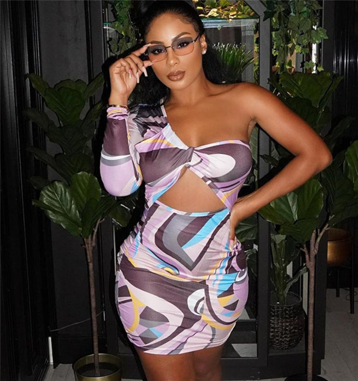 Stylish womens unilateral sleeve hollow printed dress in purple geometric print, featuring front cut-out and one-shoulder silhouette for ladies.